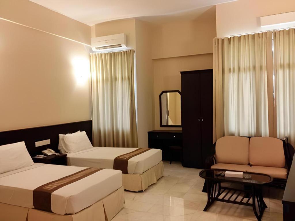สแตลเลียน สวีท ปีนัง Hotel Jelutong ภายนอก รูปภาพ