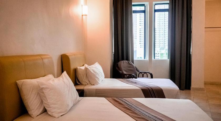 สแตลเลียน สวีท ปีนัง Hotel Jelutong ภายนอก รูปภาพ
