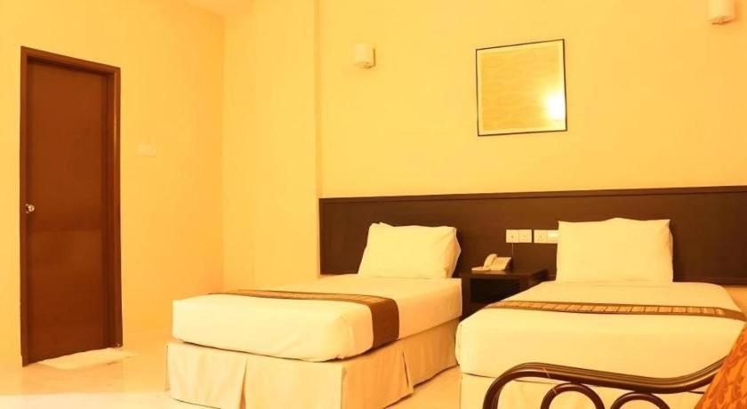 สแตลเลียน สวีท ปีนัง Hotel Jelutong ภายนอก รูปภาพ